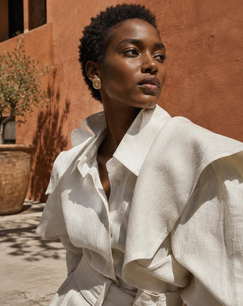 African creative professional in a sunlit contemporary setting